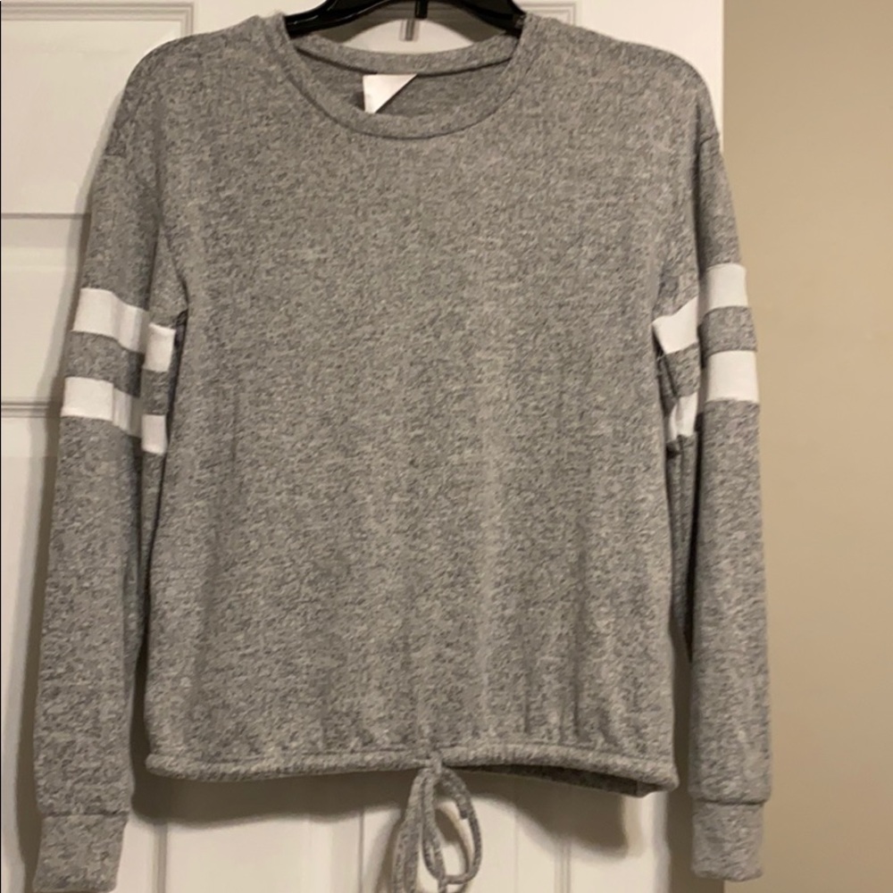 An adorable grey long sleeve top